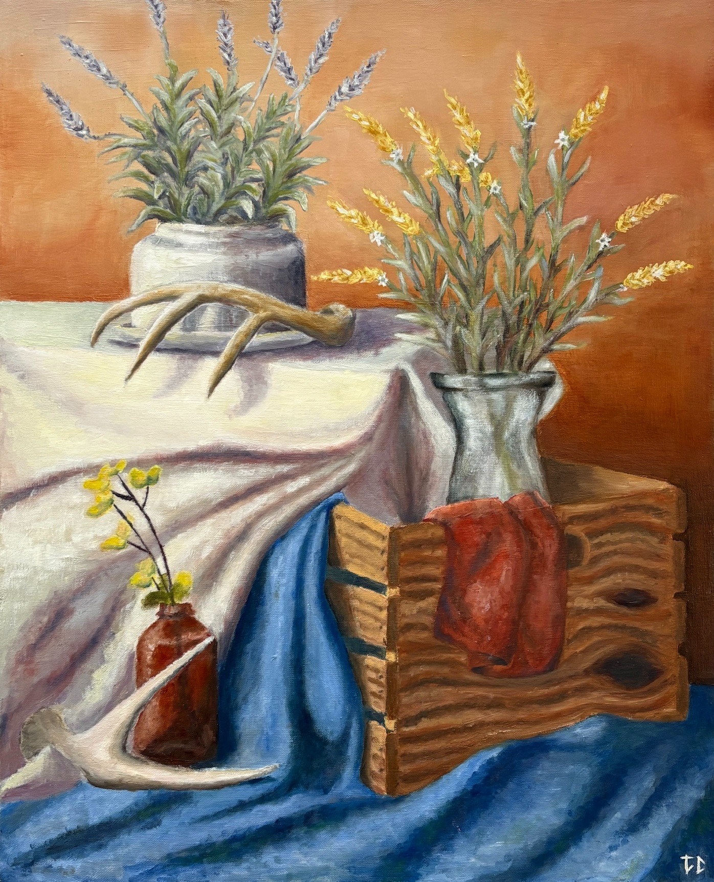 Oil painting still life with flowers, antlers, fabric, and a wooden box